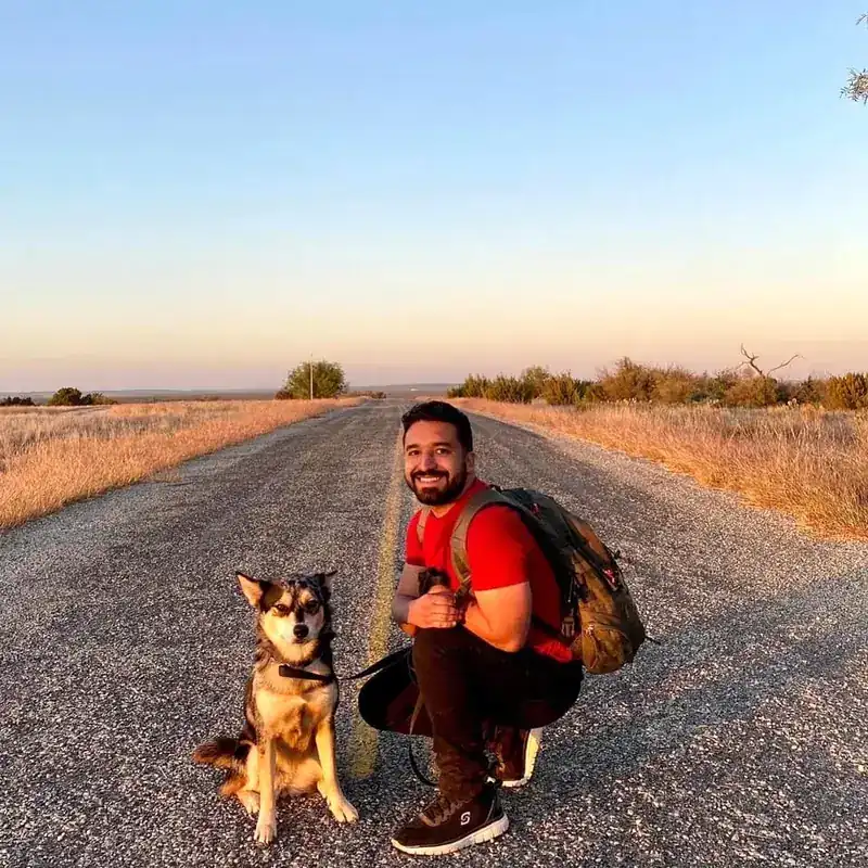 Steven Tallas, canine behavior consultant, with a dog in Austin, TX